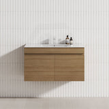 Wall-hung bathroom vanity in Tasmanian Oak, featuring a single bowl and two cabinet doors