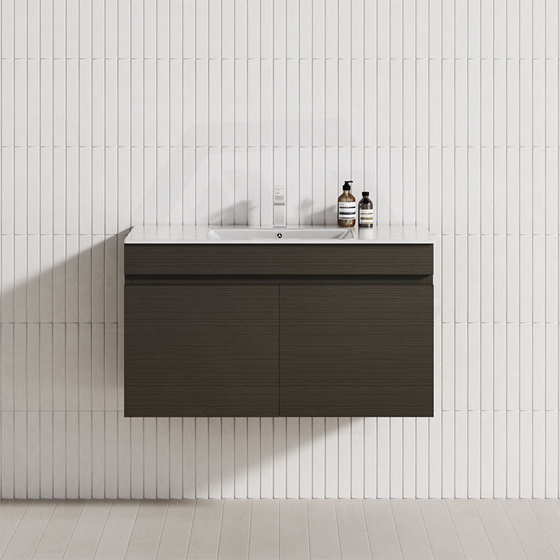 Modern bathroom vanity, designed as a floating unit with two doors in Truffle Lini finish