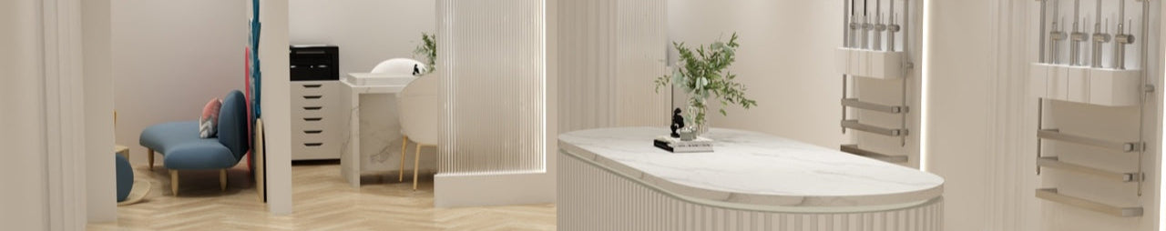 Modern bathroom interior with a freestanding bathtub, towel racks, and a vanity area.