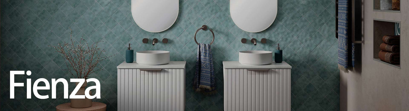 Twin vanity setup with Fienza basins, mirrors, and lighting in a designer bathroom