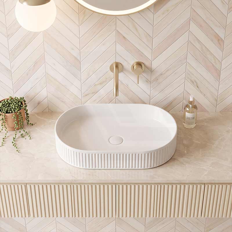 Infinity Oval Fluted Above Counter Ceramic Basin 595x375x105mm - Variant Colour