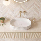 Infinity Oval Fluted Above Counter Ceramic Basin 595x375x105mm - Variant Colour