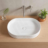 Infinity Oval Fluted Above Counter Ceramic Basin 595x375x105mm - Variant Colour