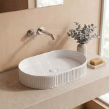 Infinity Oval Fluted Above Counter Ceramic Basin 595x375x105mm - Variant Colour