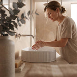 Infinity Oval Fluted Above Counter Ceramic Basin 595x375x105mm - Variant Colour