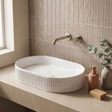Infinity Oval Fluted Above Counter Ceramic Basin 595x375x105mm - Variant Colour