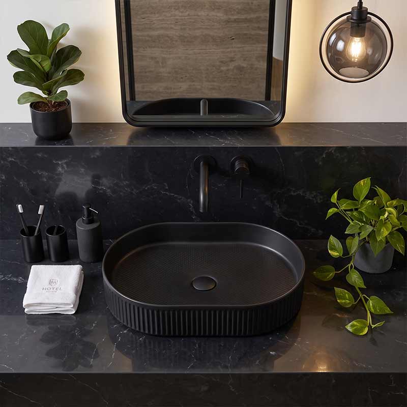 Infinity Oval Fluted Above Counter Ceramic Basin 595x375x105mm - Variant Colour