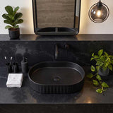 Infinity Oval Fluted Above Counter Ceramic Basin 595x375x105mm - Variant Colour