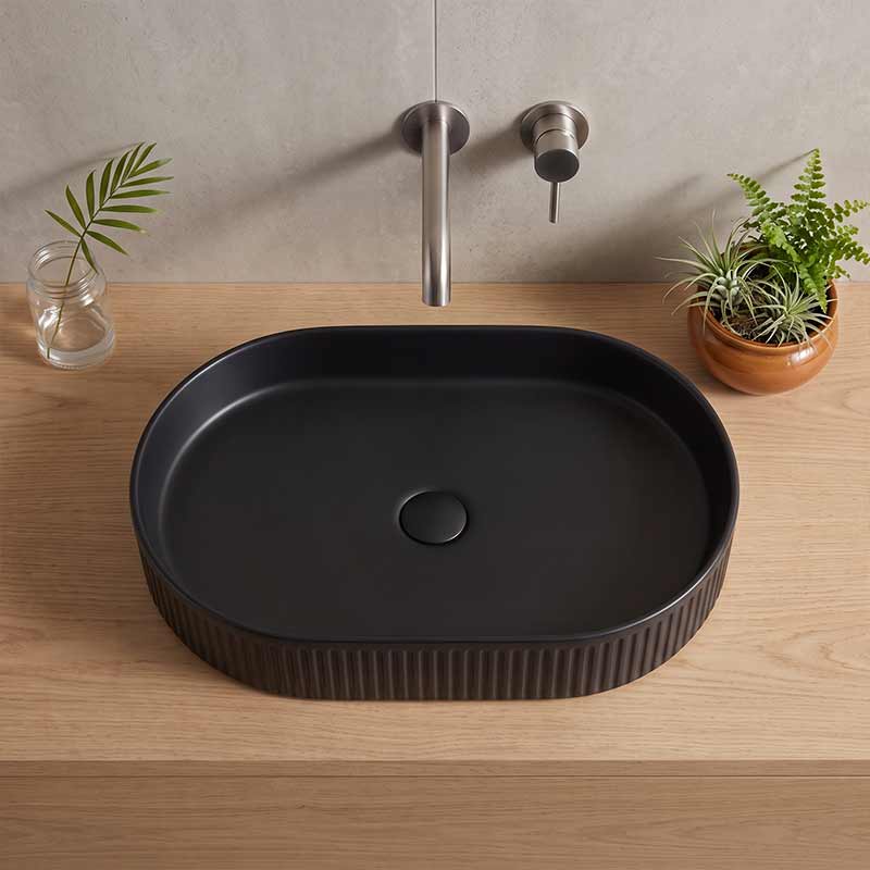 Infinity Oval Fluted Above Counter Ceramic Basin 595x375x105mm - Variant Colour