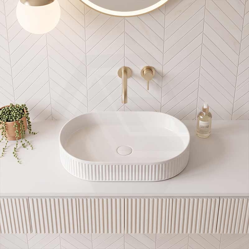 Infinity Oval Fluted Above Counter Ceramic Basin 595x375x105mm - Variant Colour