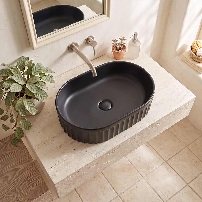 Infinity Oval Fluted Ceramic Above Counter Basin 555x355x150mm - Variant Colour