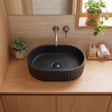 Infinity Oval Fluted Ceramic Above Counter Basin 555x355x150mm - Variant Colour