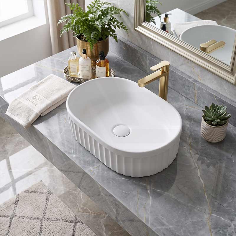 Infinity Oval Fluted Ceramic Above Counter Basin 555x355x150mm - Variant Colour