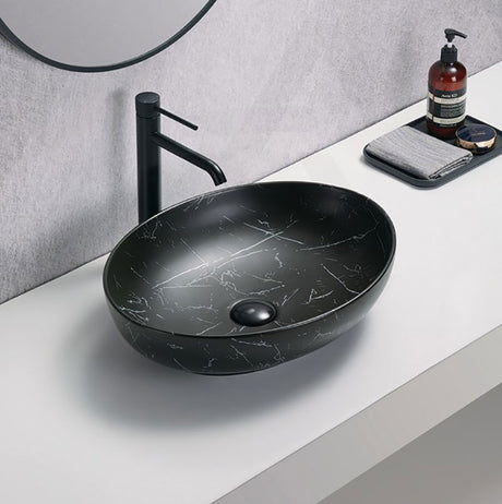 Lukka 520x395x130mm Carey Oval Above Counter Basin Ceramic Matt Marble White/ Matt Marble Black