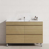 A bathroom design with a wooden vanity and white tiled wall, featuring a 4-drawer cabinet in Tuross Oak