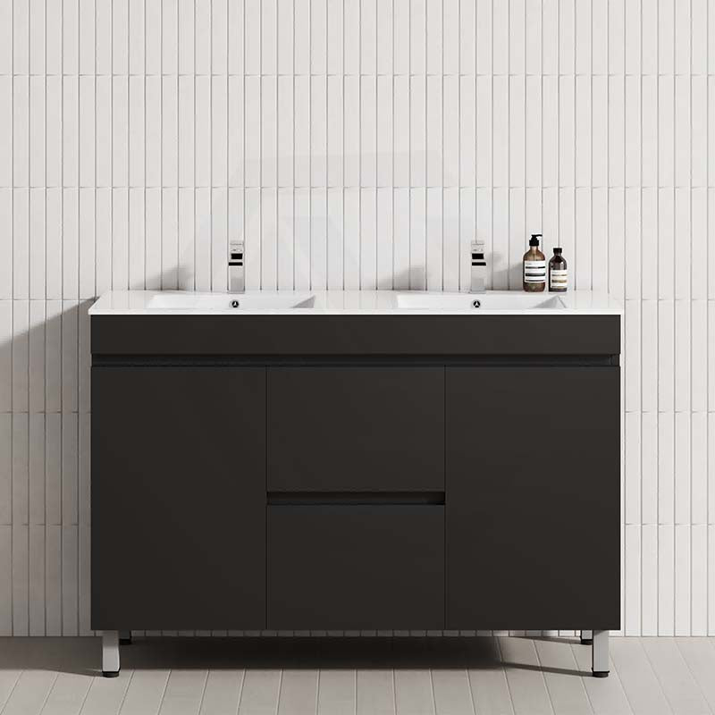 Modern bathroom vanity with double bowls featuring a matte black cabinet with drawers and doors