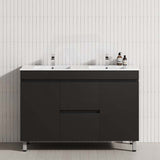 Modern bathroom vanity with double bowls featuring a matte black cabinet with drawers and doors