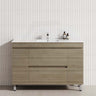 Modern bathroom vanity with a white tile wall, featuring a Maison Oak finish and a single bowl design