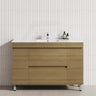 Modern bathroom vanity in prime oak with a white tiled wall, featuring 2 drawers and 2 doors for storage