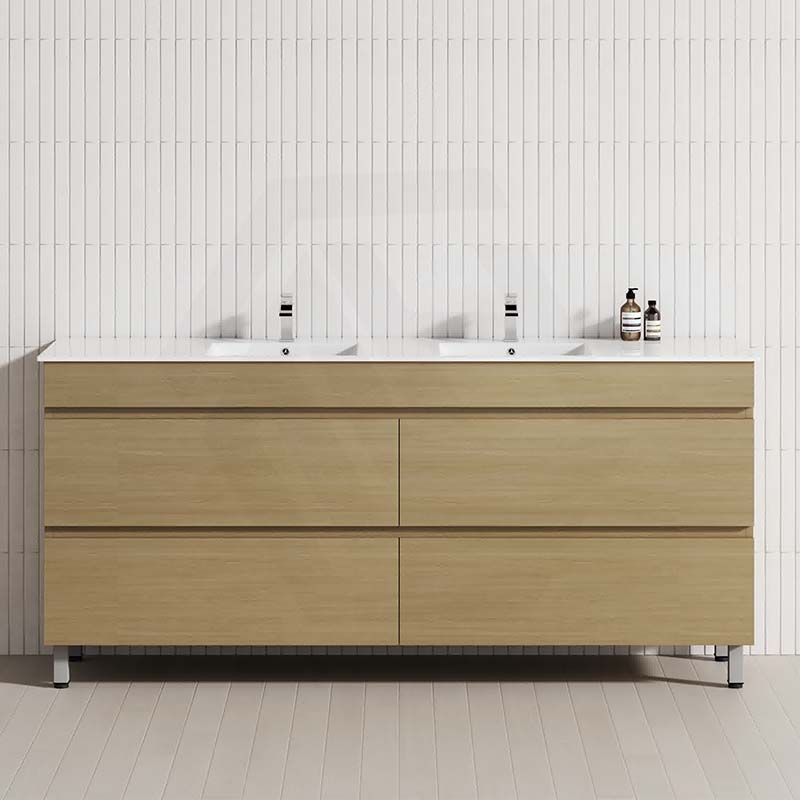 Tuross Oak bathroom freestanding leg vanity with four drawers against a tiled wall